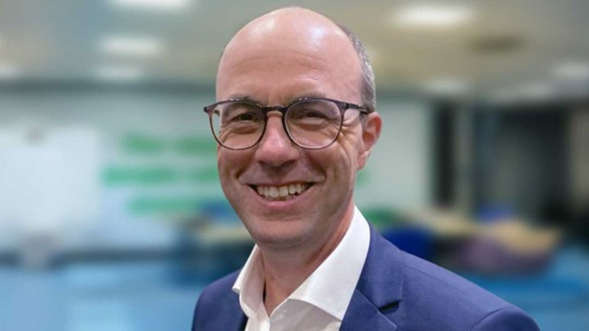 A picture of Angus Eaton smiling at the camera